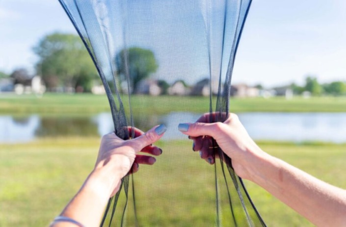 ProVia FlexScreen being installed into a window screen pocket